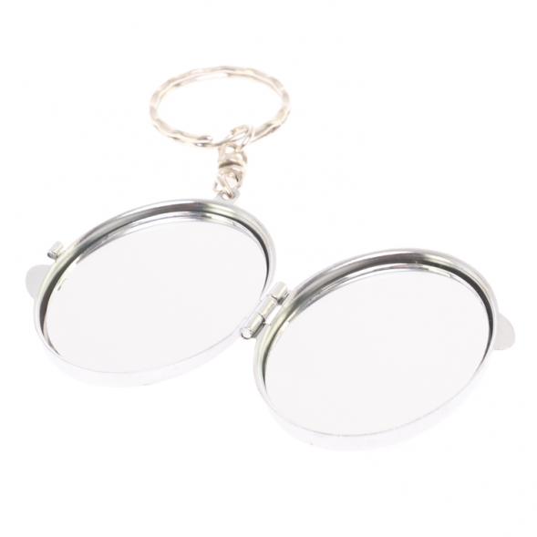 Складное зеркало брелок из серафинита овальное 126590